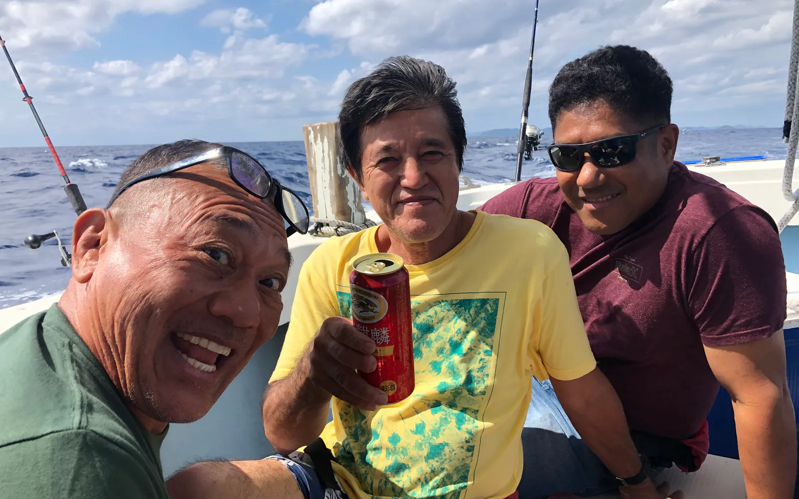A candid group moment together on the water in Okinawa